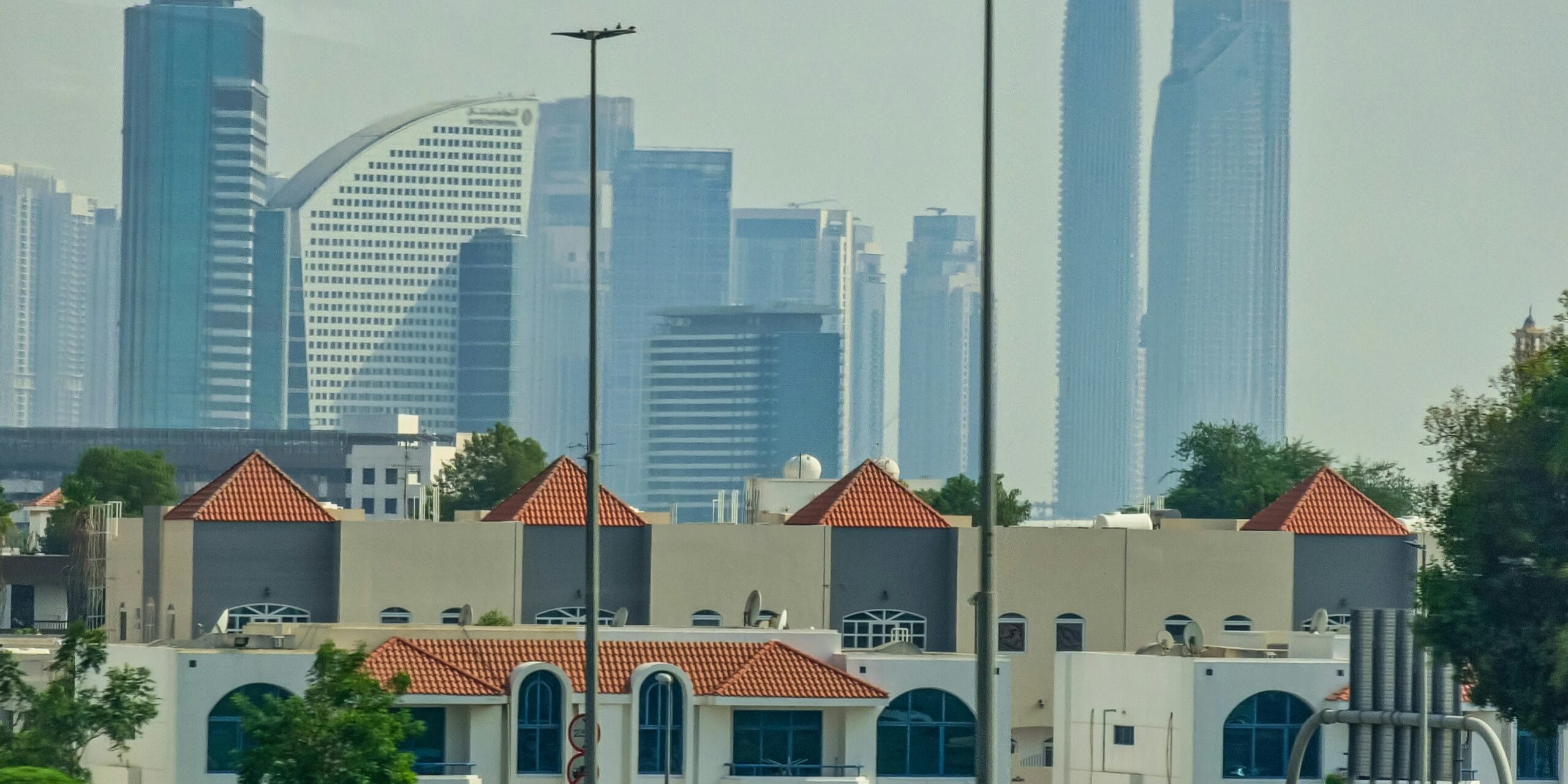 a view of a a view of a city with tall buildings in the background