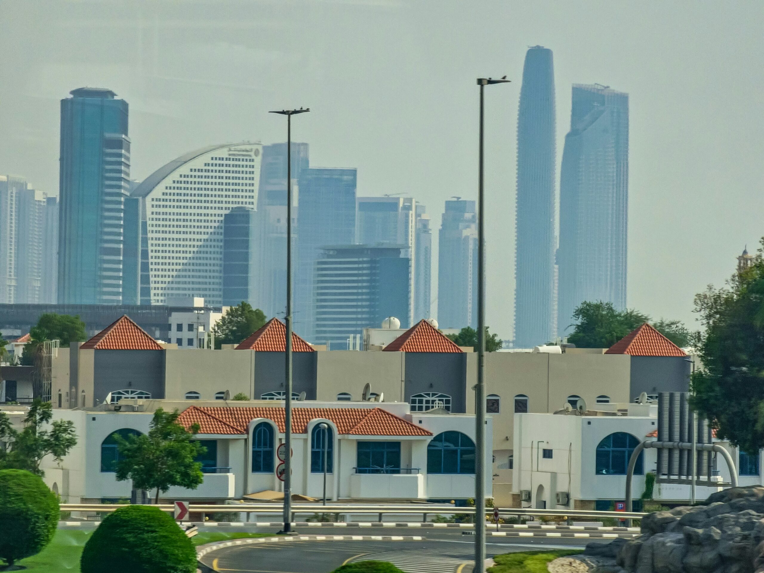 a view of a a view of a city with tall buildings in the background